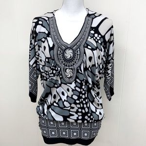 3/4 sleeve printed top. size small